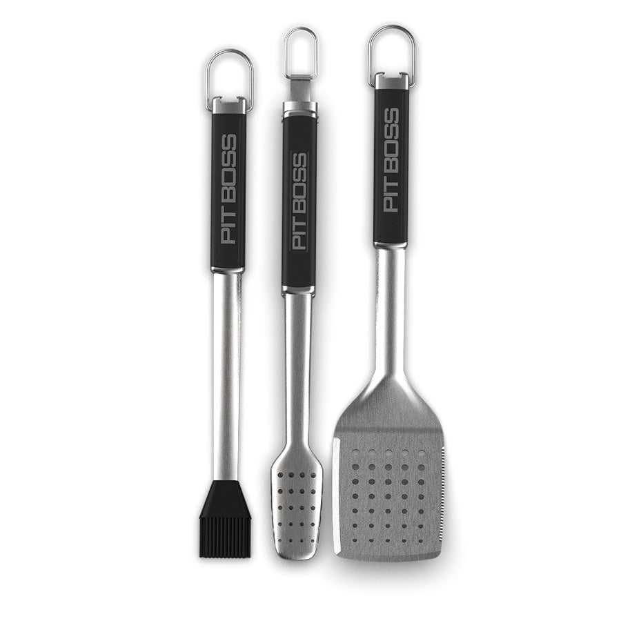Pit Boss 3-Piece BBQ set. Stainless steel with black handles and pit boss logo for grilling and smoking. Includes spatula, tons, and sauce mop