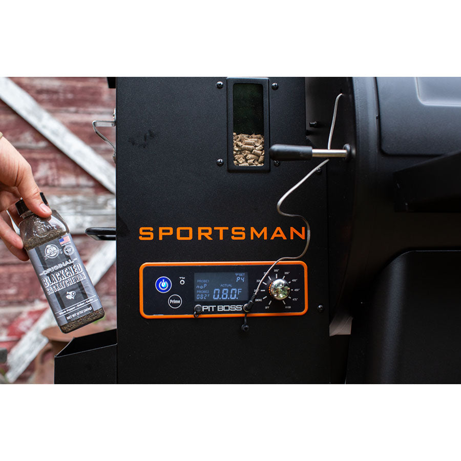 close up of pellet hopper and digital control board with orange sportsman logo